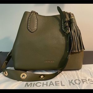 Michael Kors olive green handbag with studded tassel